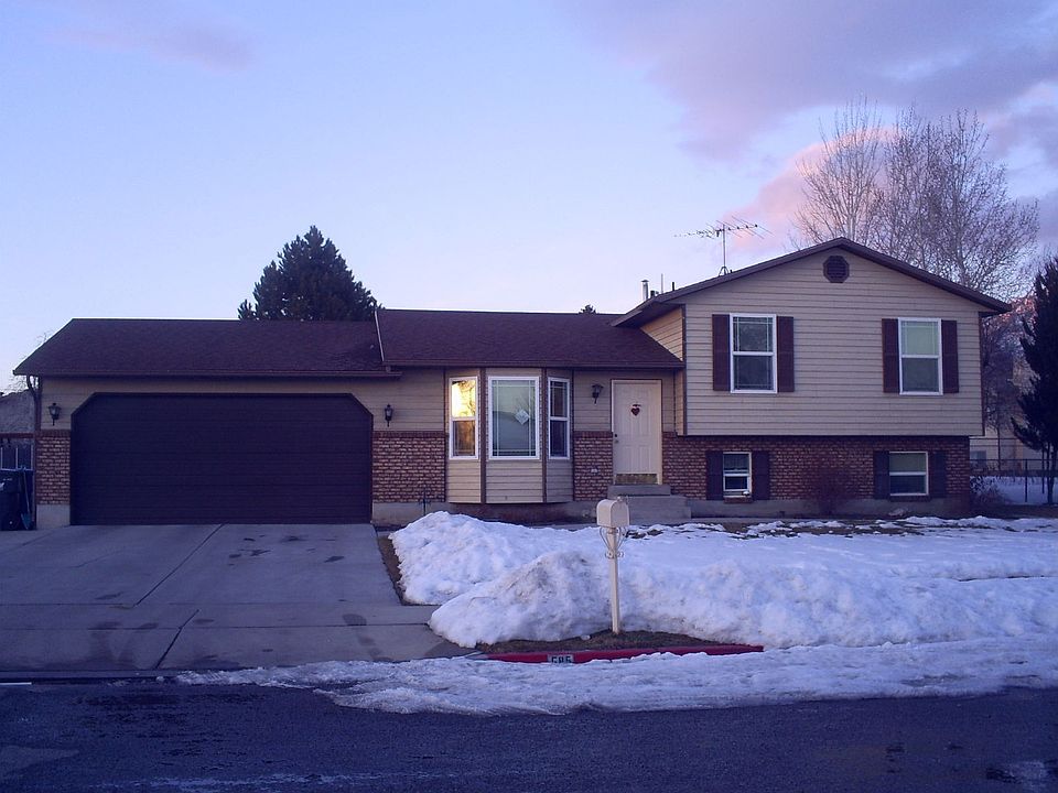 Exterior of the Home, I like the tree with the blue sky, happens daily!