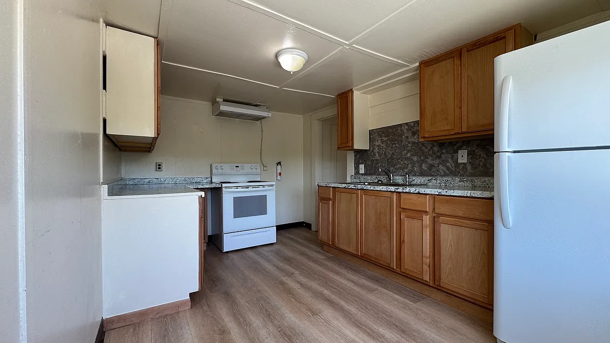 New kitchen upper and lower cabinets with new sink. - 3036 NE Highway 101 #3