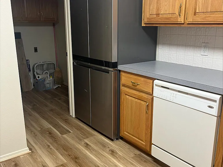 Kitchen with refrigerator installed