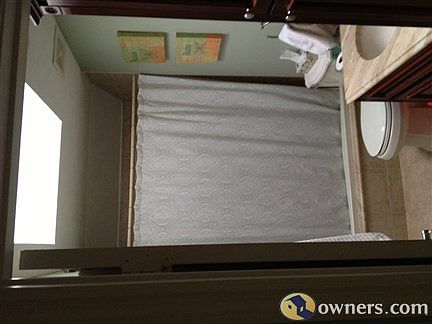 Full bath with marble countertops