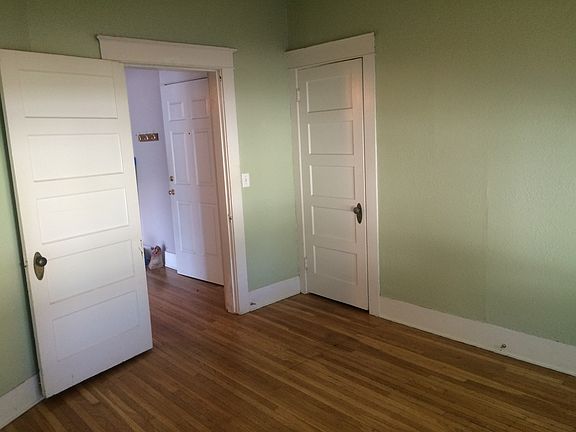 Bedroom with hardwood floors