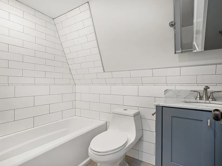 Full bath on third level shared with bedrooms 3 & 4