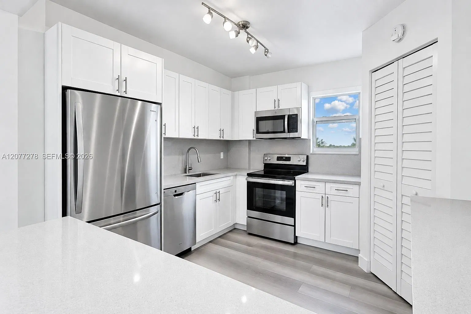 9273 Collins Ave — Photo 1