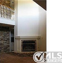 Corner fireplace. Living room and dining room have recently inst