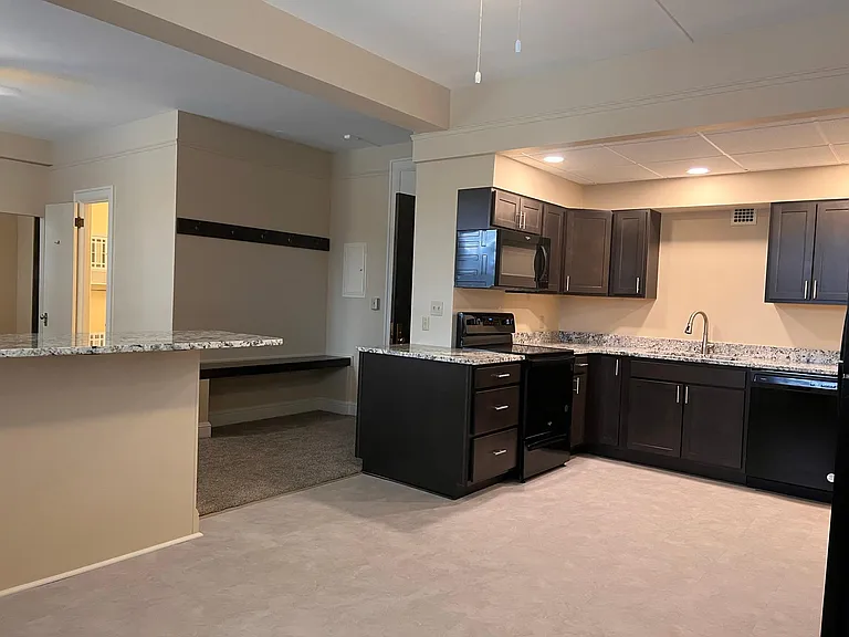 Open concept kitchen and living room.