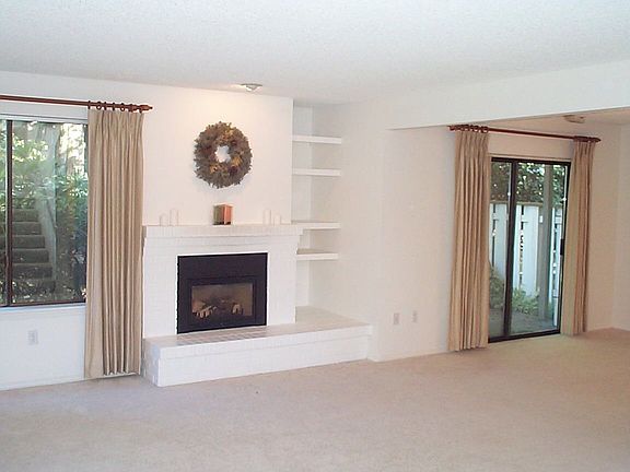 Living room with gas fireplace.