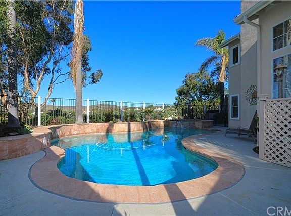 Pool and Spa in back yard with views of the hills.
