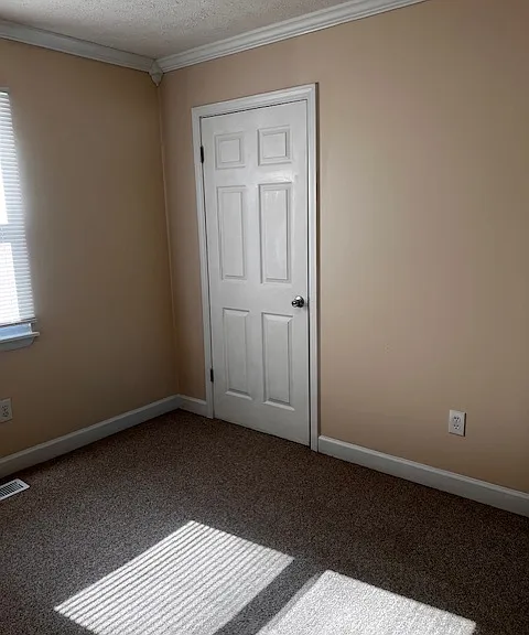 Bedroom 1 (upstairs), showing door to closet