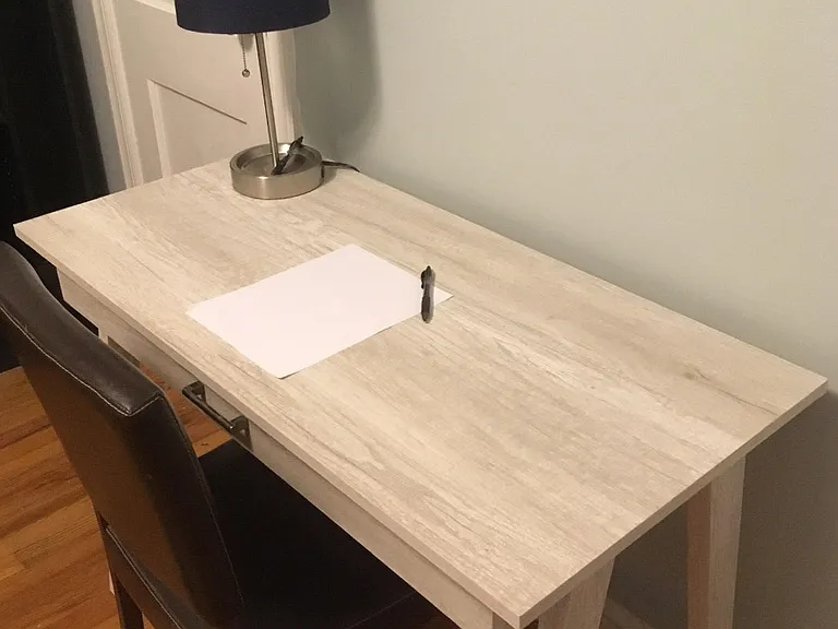 west room available (desk pictured). full size closet. furnished with desk, bed, shelving. chest of drawers