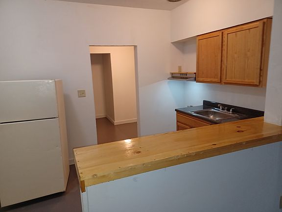 kitchen will have a stove and refrigerator