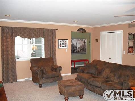Open and uncluttered! Expansive 20X16. Big enough to host your New Year's party!
