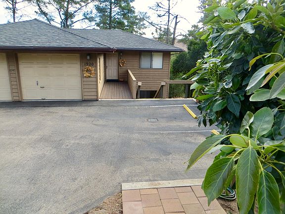 Driveway, parking, and garage areas.
