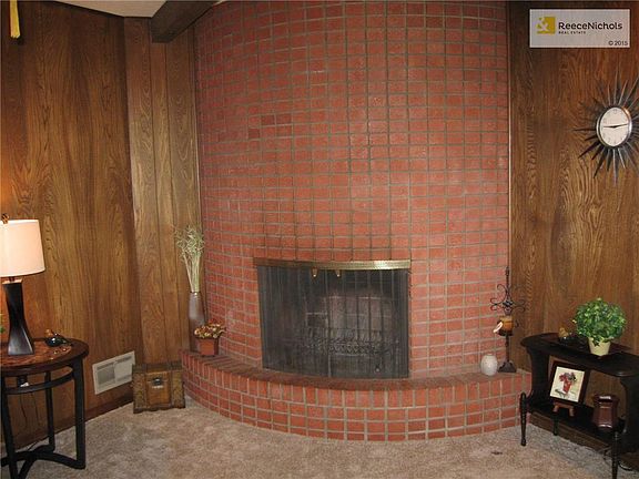 First floor family room with wood burning fireplace