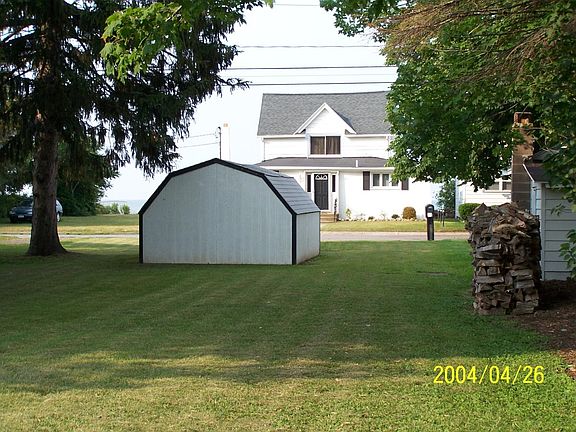 Background, shed and large lot.