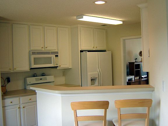 Breakfast Bar and Kitchen - looks out on Family Room