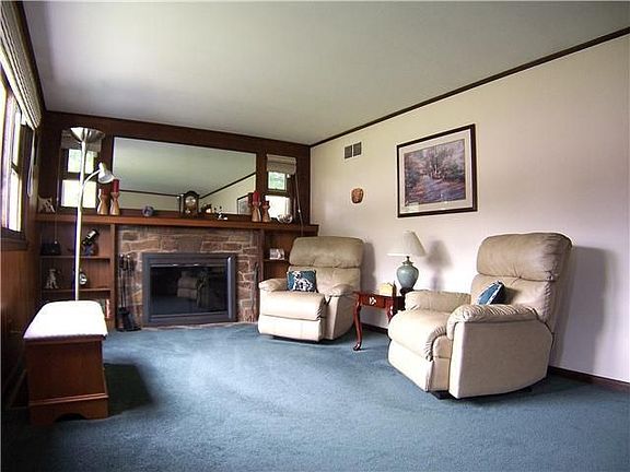 LR, plenty of natural light & Wood burning FP