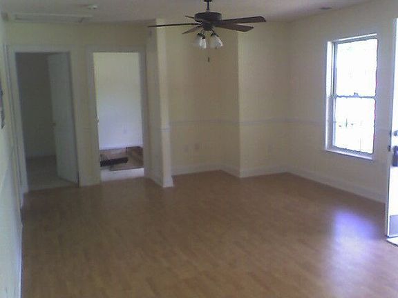 Large great room with new hardwood laminate