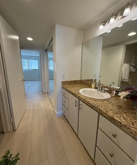 2nd bedroom with granite counter top sink
