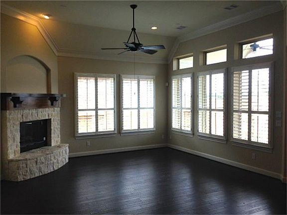 Spacious living room with plantation shutters