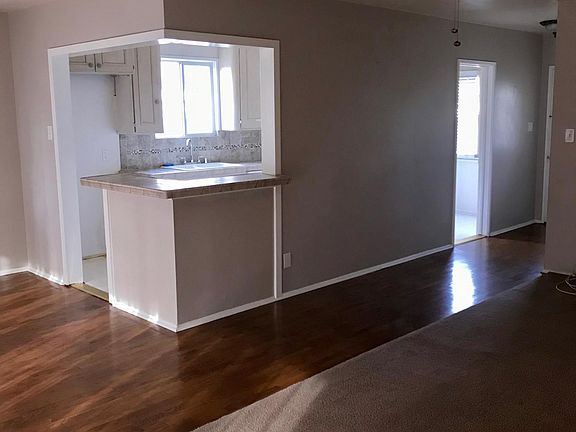 Living room view to kitchen bar