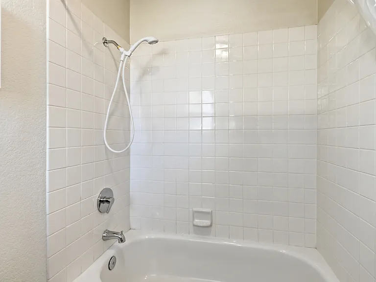 Unwind in style with this serene, well-appointed bathroom
