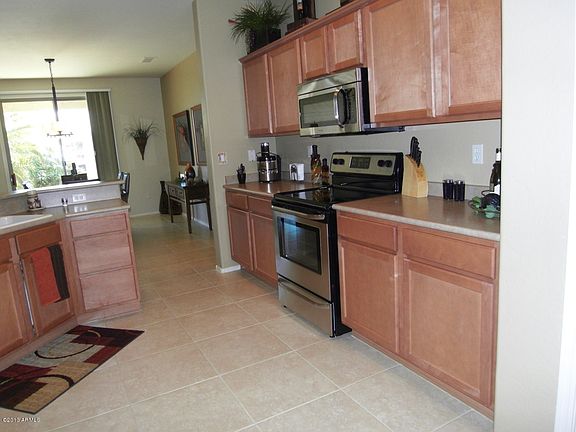5th image of 16989 W Desert Sunrise Ln