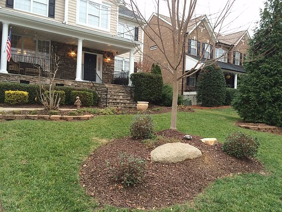 Front yard rock plant bed
