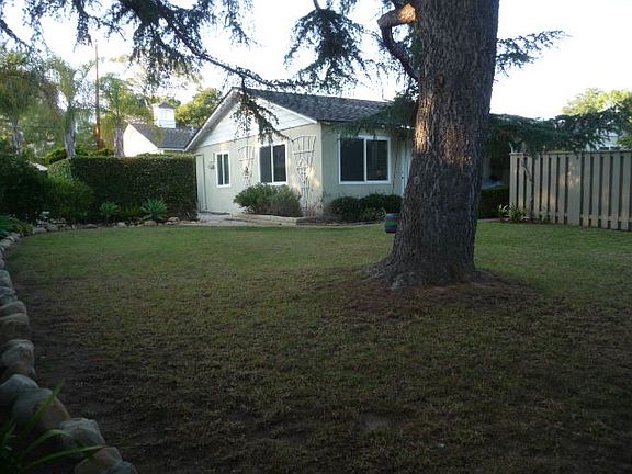 Large yard and cottage.