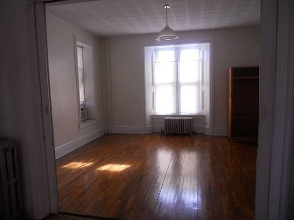Main bedroom with sliding doors to the living room