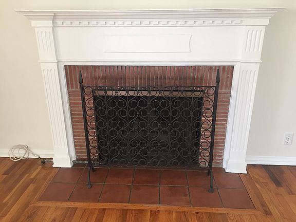 Working fireplace in living room.