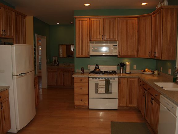 Gourmet Kitchen with Maple Floors and Hickory Cabinets
