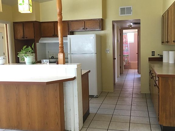 Bright kitchen off bonus family room.