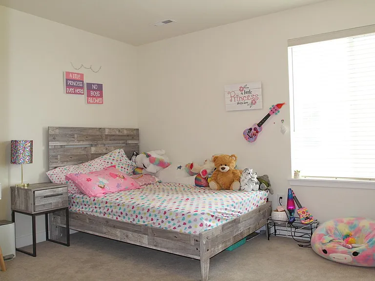 Bedroom 3 is 11' 8" by 10' 9"