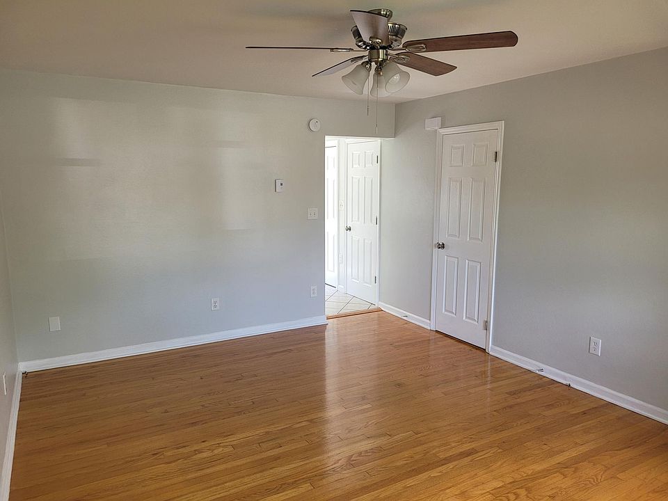 Living Room w/light grey paint and brush nickel