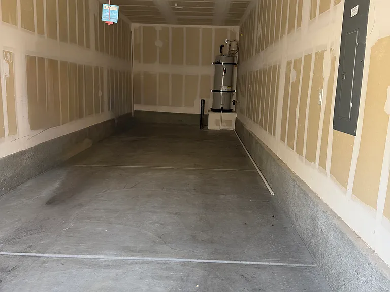 Garage interior: "2-car tandem garage.