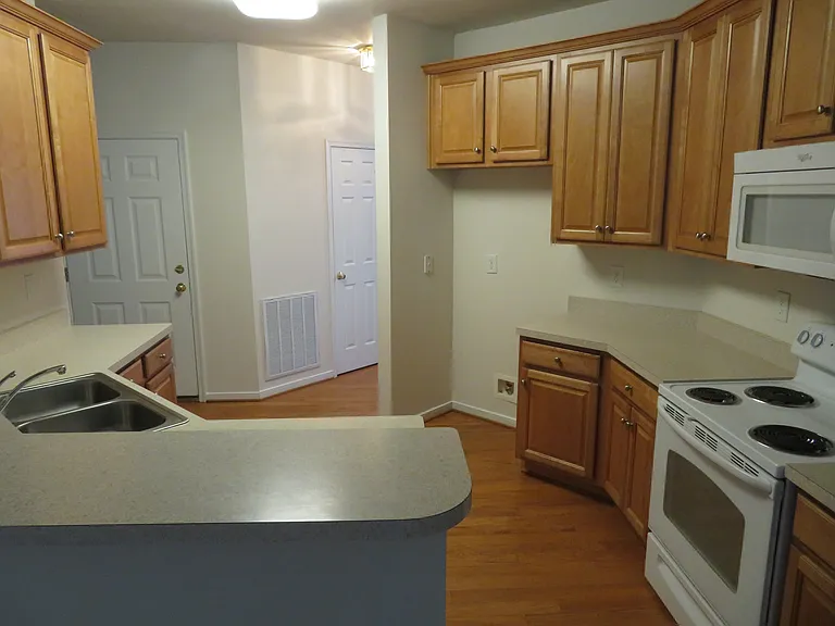 Kitchen (All new stainless steel appliances) - Range, Microwave, Refirigerator and Dishwasher.