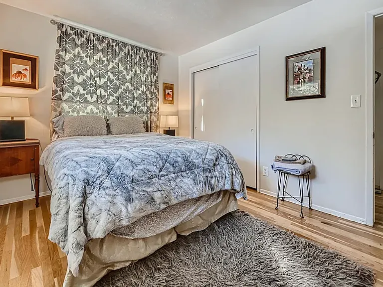 2nd bedroom upper level. queen bed, new mattress, new decor, hand made art, fully furnished.
