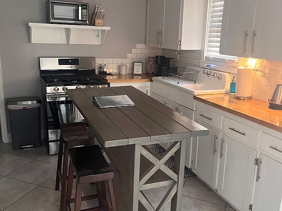 Kitchen with gas stovetop.