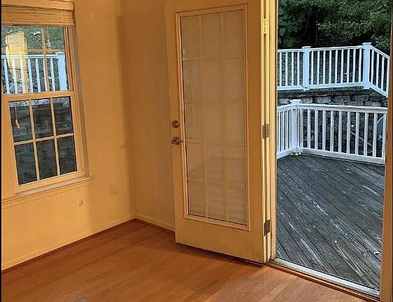 Dining area with peaceful scenic view and large deck great for entertaining, morning coffee or evening wind down.