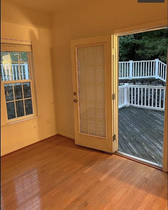 Dining area with peaceful scenic view and large deck great for entertaining, morning coffee or evening wind down.