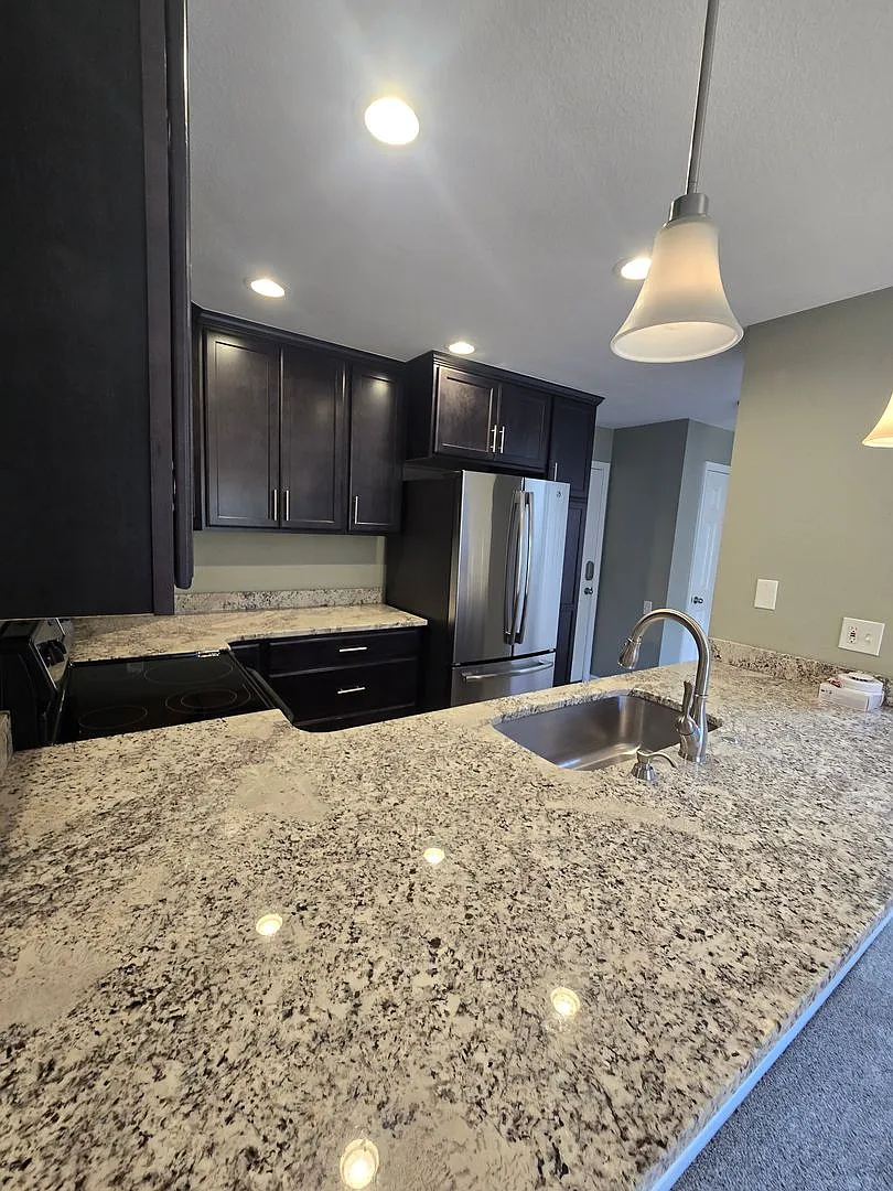 Beautifully Updated 3-Bedroom Townhome with Attached 2-Car Garage! — Photo 4