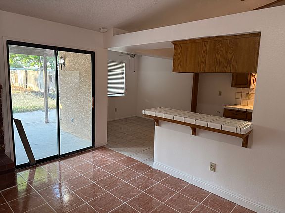 sliding door to patio and backyard