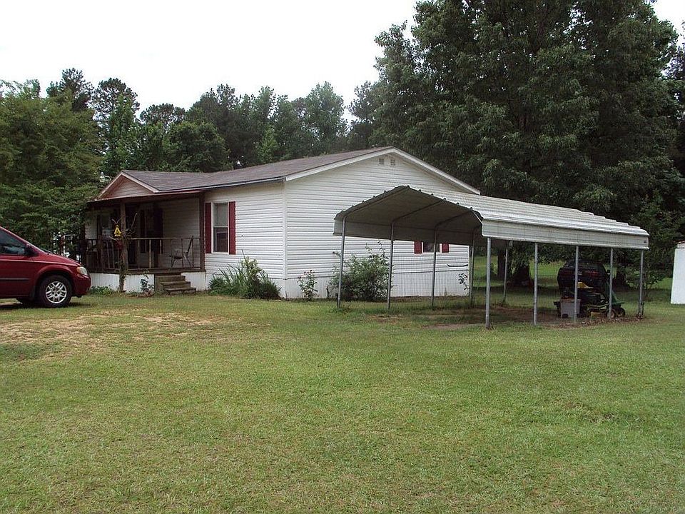 Right Side With Carport