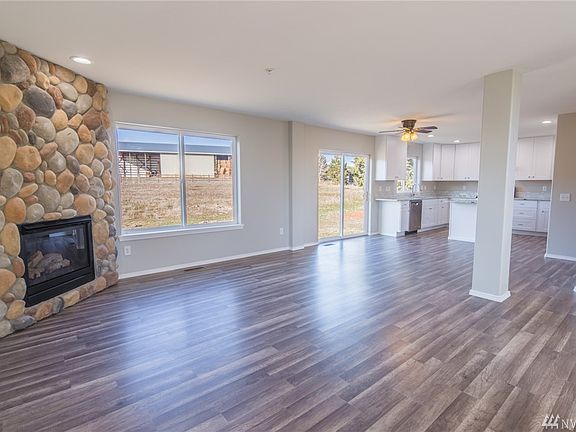 Looking towards the dining area and kitchen from the living room.