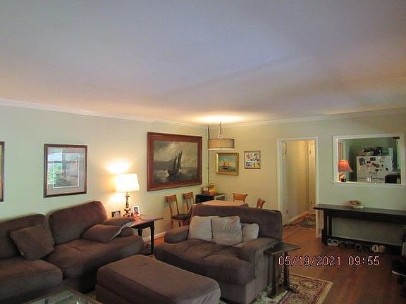 Walk into a large living space with energy efficient windows for natural sunlight. Plenty of room for a dinette table. Please excuse the clutter. The home will be empty and in top notch shape for your move in day!