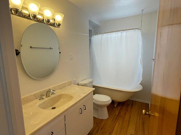 Upstairs bathroom with clawfoot bathtub