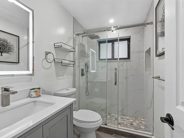 830 NE 59th Ct — Photo 20