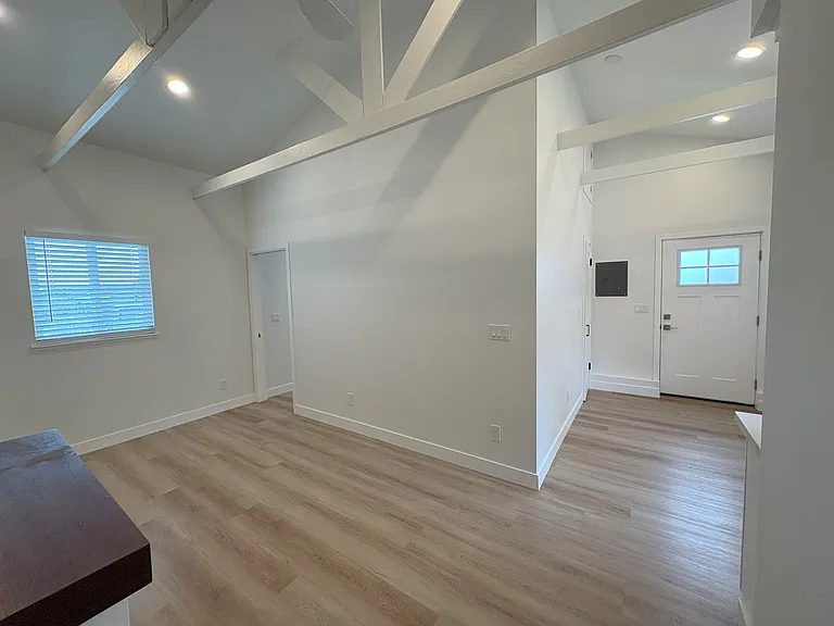 View of living and dining rooms from bathroom