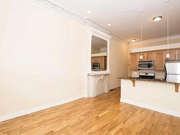 Original marble fireplace (non-working) and mantle.