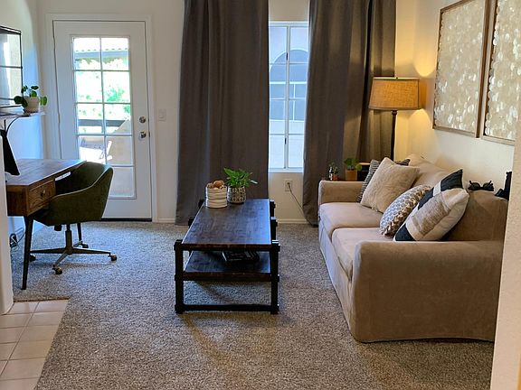 Cute living room with pull out couch- full size bed